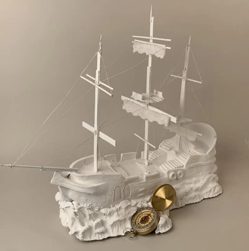 Plaster ship sculpture
