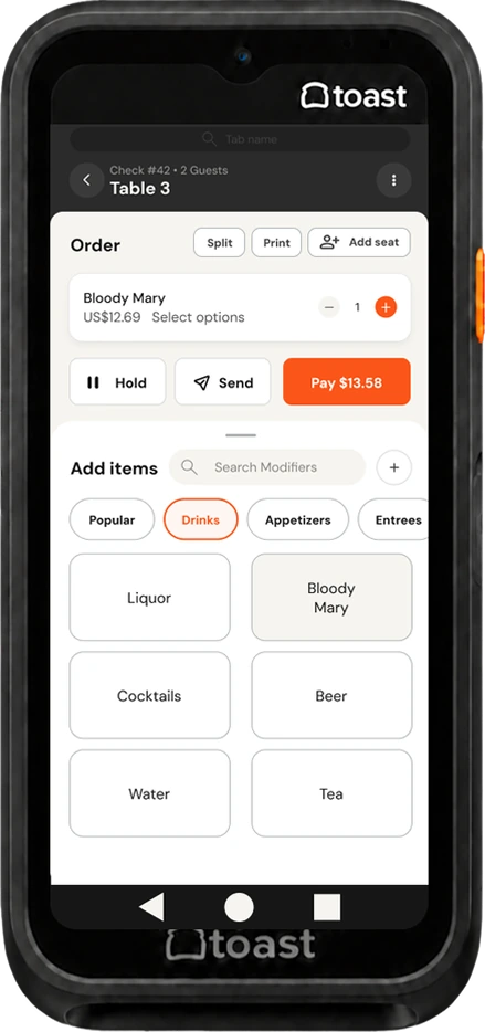 The redesigned order screen with a clear order summary, large item buttons, and a single pay action